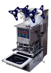 塑料盒自動(dòng)灌裝封口機(jī)(全不銹鋼)