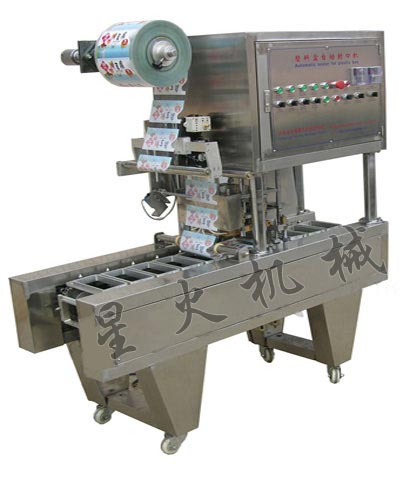 塑料盒全自動灌裝封口機(jī)