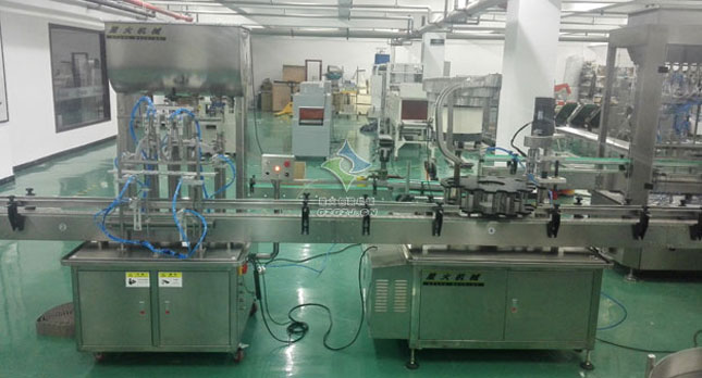 橄欖油自動(dòng)灌裝鎖蓋貼標(biāo)生產(chǎn)線(xiàn)